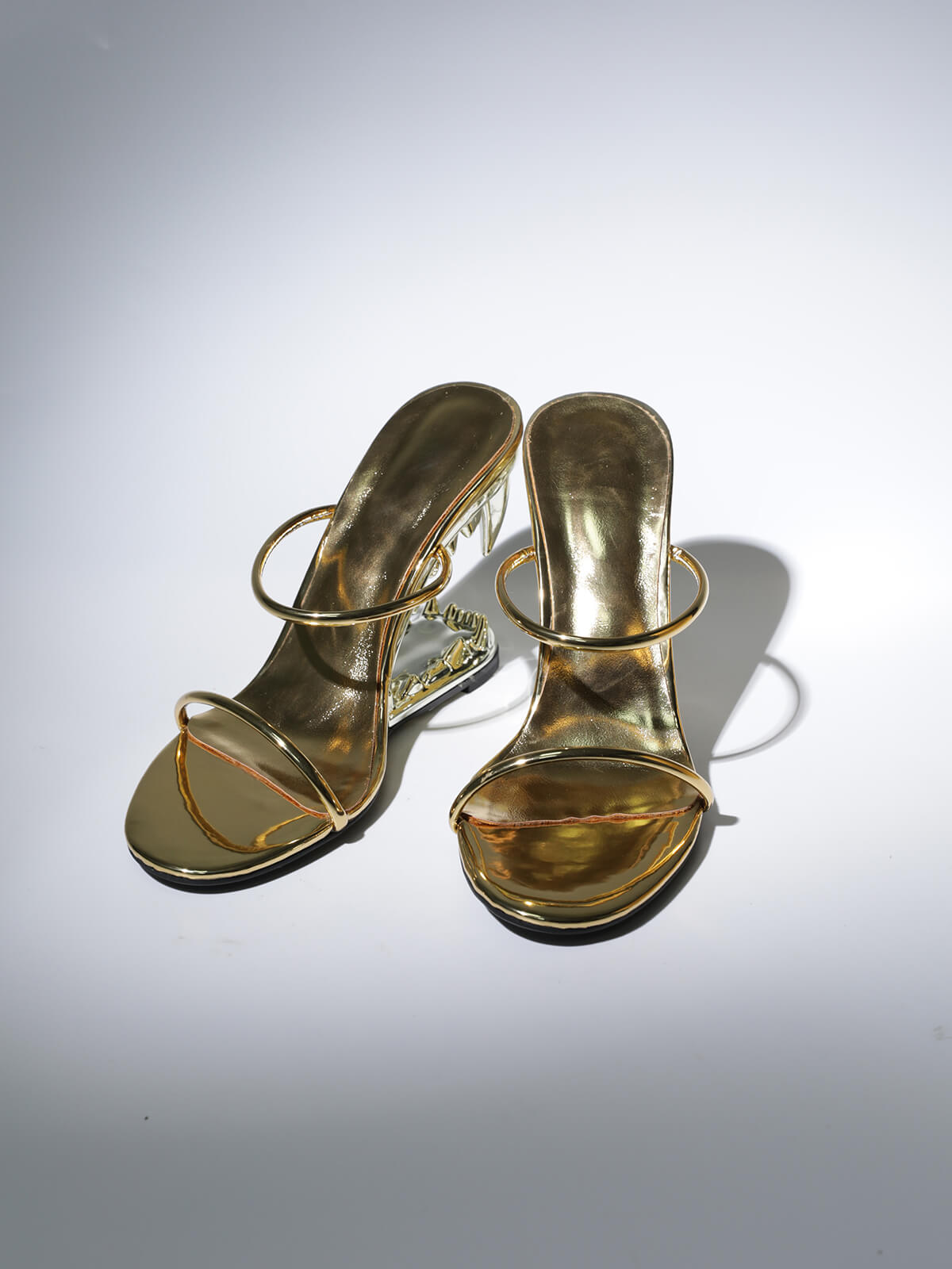 Gale Tiger Tooth Cutout Heels In Gold