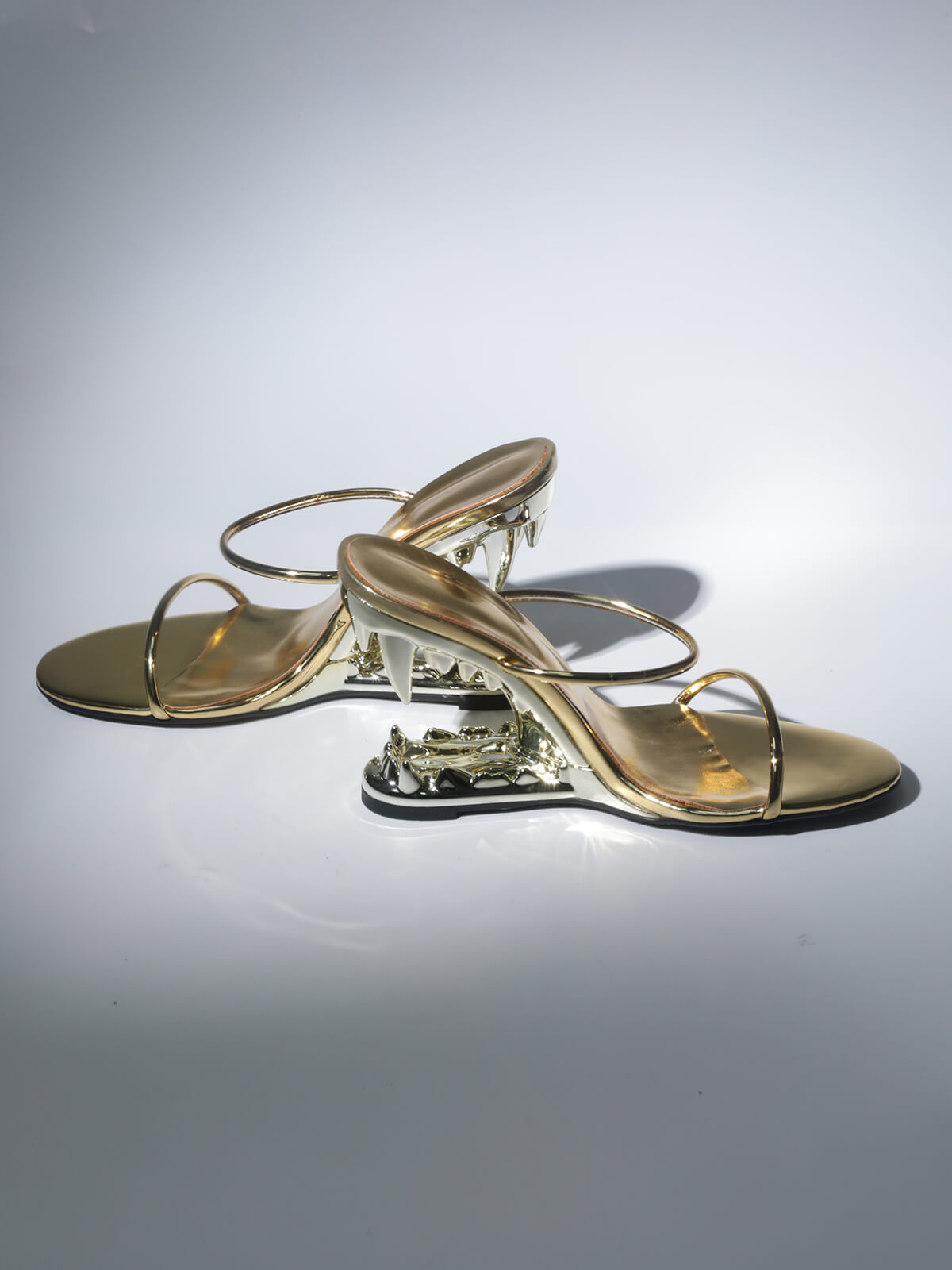 Gale Tiger Tooth Cutout Heels In Gold