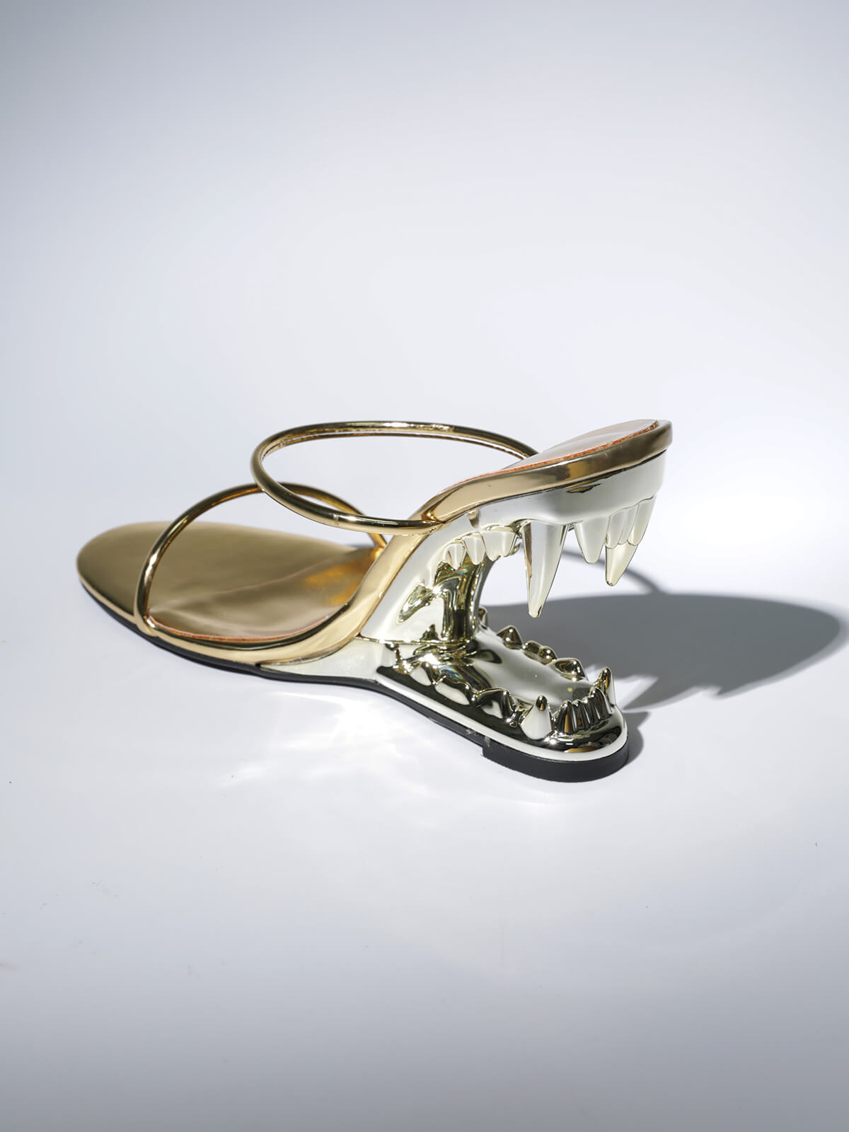 Gale Tiger Tooth Cutout Heels In Gold