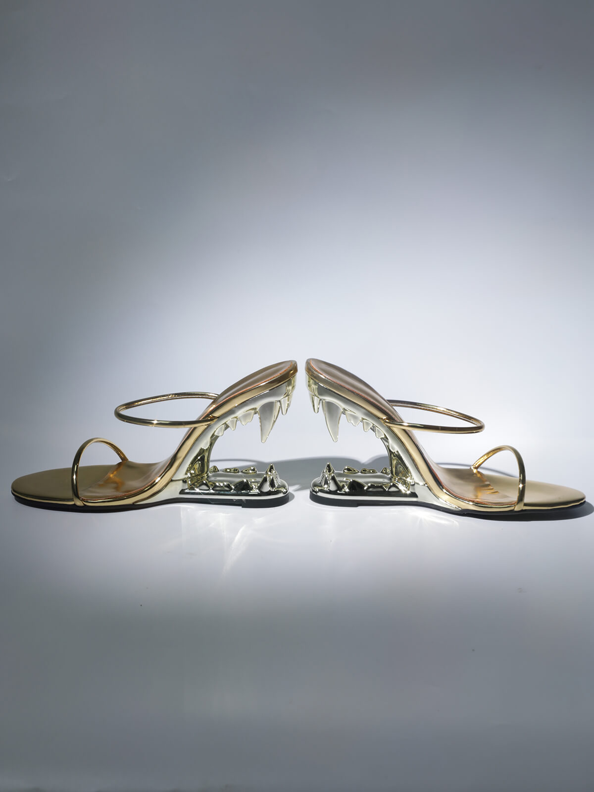 Gale Tiger Tooth Cutout Heels In Gold
